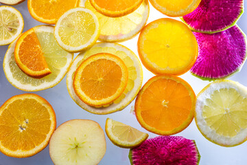 colorful versions of freshly sliced citrus fruits