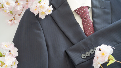 桜の花とスーツ｜入学・卒業・入社イメージ