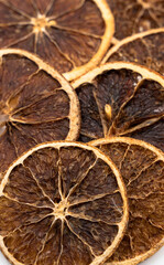 Dried orange slices isolated on a white background. Orange fruit chips.