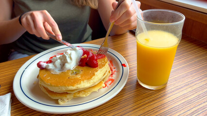 Eating freshly baked pancakes - travel photography