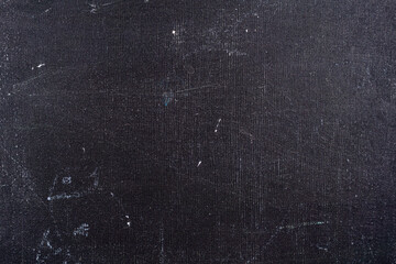 Chalkboard background with traces of chalk. Back to school doodles on chalkboard background.