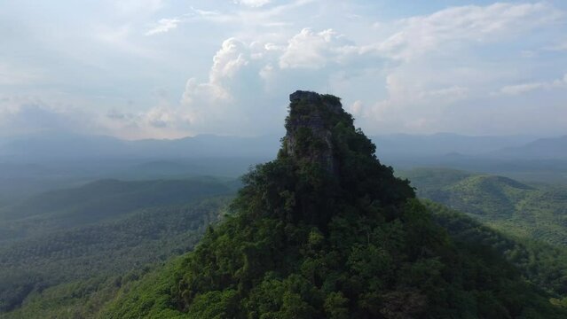 Aerial view of a hill and surrounding tropical rainforest. Lion Hill, Perak, Malaysia.