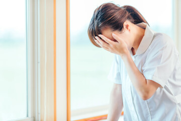 落ち込む看護師
