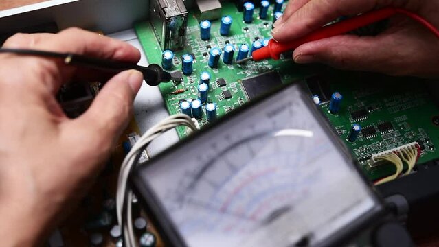 electrician using multimeter 