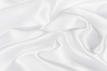 Abstract white silk fabric texture background. Creases of satin