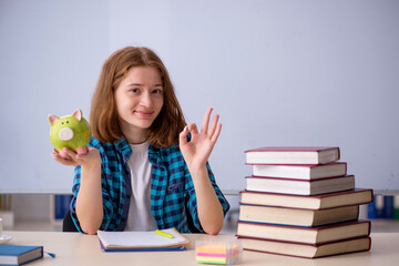 Young female student in expensive education concept