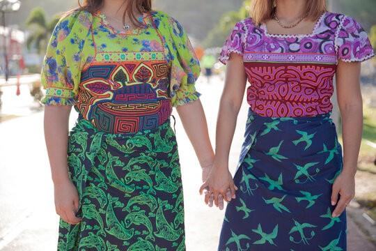 Women indigenous Guna of Panama modeling for the camera 