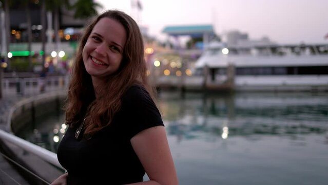 Young woman at Miami Bayside - close up shot in the evening - travel photography