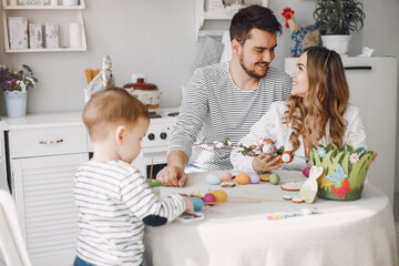 Obraz na płótnie Canvas Family with little son in a kitchen