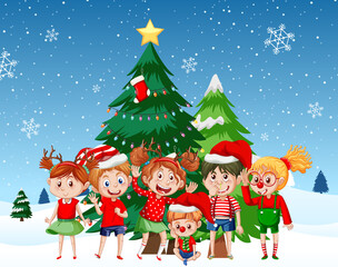 Children in Christmas costumes with Christmas tree