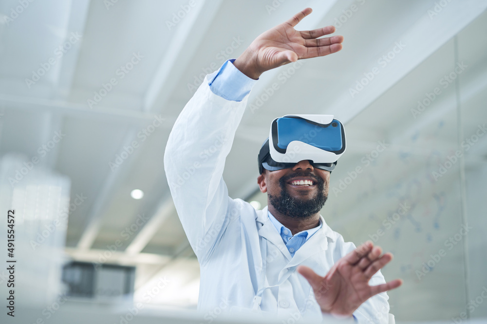 Aufkleber Shaping a whole new world through science. Shot of a mature scientist using a virtual reality headset while working in a lab.
