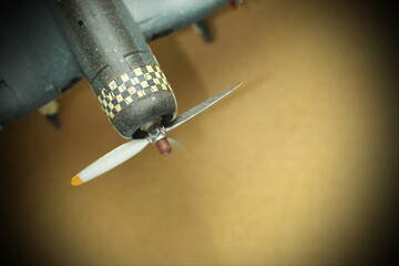 Miniature model of old fashion war plane represent war weapon and aircraft concept related idea.