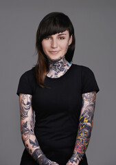 Let your beauty rise to the surface. A cropped studio portrait of a beautiful tattooed young woman.