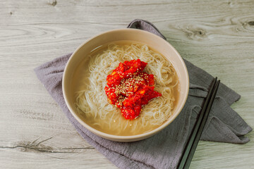 Hoenaengmyeon, Korean style Cold Buckwheat Noodles with Raw Fish : This dish consists of naengmyeon (cold buckwheat noodles) mixed with a spicy red chili powder and topped with pollock(sliced and seas