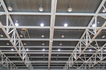 Lighting in a large sports hall as a backdrop.