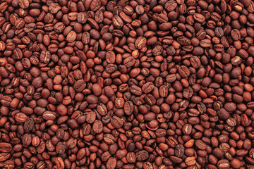 dark brown roast coffee beans background