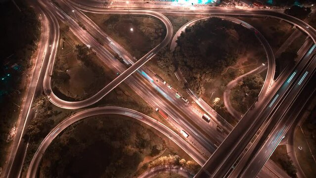 4K UHD : Aerial time lapse in motion drone shot of freeway and interstate traffic. cars and light streaks. hyperlapse traffic
