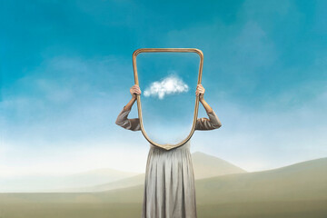 the woman hides holding a mirror in front of her face; introspection path concept - 491567329
