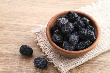 Kurma Ajwa, Ajwa Dates, served in small plate. Kurma Ajwa is one of the special fruit of Arabic.
