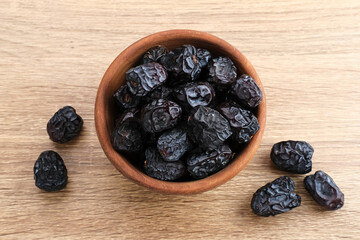 Kurma Ajwa, Ajwa Dates, served in small plate. Kurma Ajwa is one of the special fruit of Arabic.
