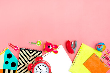 tationary, back to school, summer time, creativity and education concept. Supplies - notepad, pencils, paper clips, note, stapler on pink background, flatlay Mock up Top view