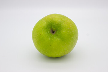One green apple on white background