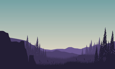 Stunning mountain views and silhouettes of pine trees on the edge of the cliff