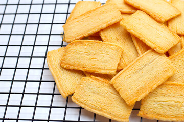 Cheese crispies on metal cooling rack
