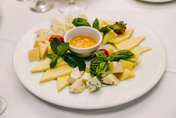 Plate with different types of cheeses