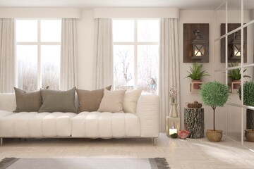 Fototapeta premium White living room with sofa and winter landscape in window. Scandinavian interior design. 3D illustration