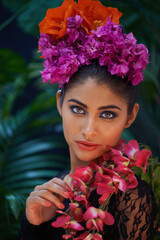 Beautiful culture. A portrait of a beautiful woman wearing colorful flowers.