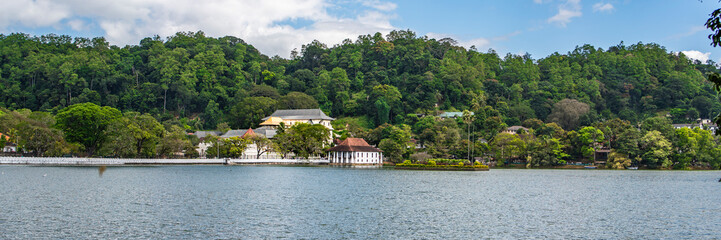 Fototapeta na wymiar View over the lake to Sri Dalada Maligawa or the Temple of the Sacred Tooth Relic