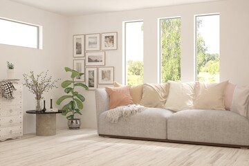 White living room with sofa and summer landscape in window. Scandinavian interior design. 3D illustration