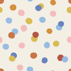 Multicoloured childish confetti spotted vector seamless pattern. Infantile dotted gender neutral colours background. Kid-like mottled surface design for fabric or Scandinavian style nursery.