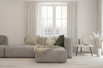 Modern living room in white color with sofa and winter landscape in window. Scandinavian interior design. 3D illustration