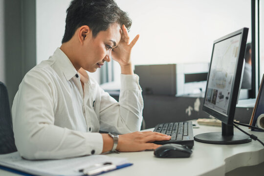 Business Woman Sitting At Desktop In Office And Holding Hand On Head. Hard Working Day.  Woman Are Stressed Out At Work, Businesswoman Working On Computer. Desperate Employee