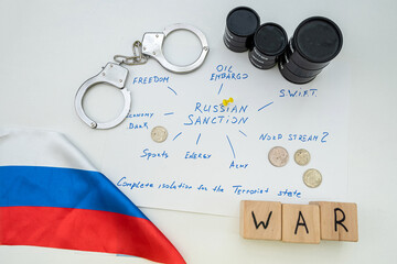 sheet of paper on the diagram are painted sanctions against Russia and cut off from the world.