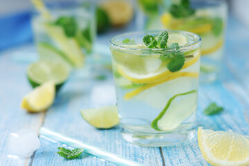 Glasses with lemon and lime lemonade