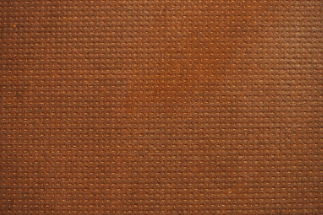 Texture of an industrial or commercial waterproof plywood or hardboard. Wooden hardboard or fiberboard texuture used for professional installs of industry flooring or in a van