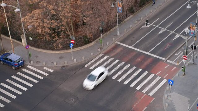 Bucharest from above during a winter sunrise. 4k video with the morning traffic on Calea Victoriei from Bucharest, Romania.