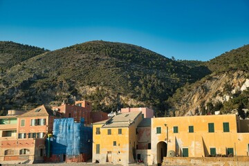 Obraz premium the beautiful Saracen village of Varigotti, with its warm colored houses, on the western Ligurian Riviera