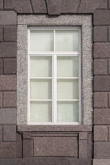 A wooden window on a granite wall. A window to Europe.