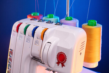 Professional overlock sewing machine with multicolored thread