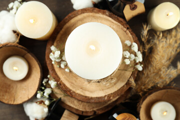 Fototapeta na wymiar Concept of relaxation with aroma candles, top view
