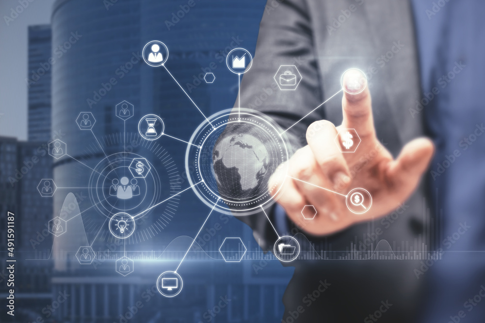 Aufkleber close up of businessman hand pointing at abstract glowing business data and earth hologram on blurry