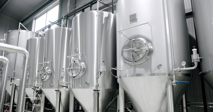 Modern tank for mashing malt for brewing beer in brewery plant. Brewing production. Distiller Sample, Bavaria Lab, Checking Laboratory. Beer production. Brewery, Beer factory concept.