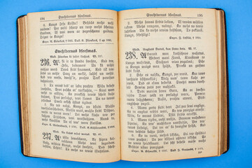 Fototapeta premium Old, Vintage Bible book on blue background