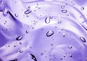Liquid gel cosmetic smudge blue purple background