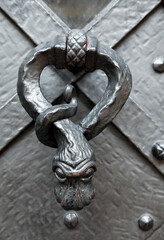 Door knocker in a shape of a snake