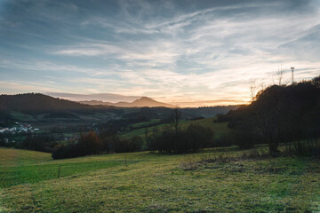 sunset in the mountains . Behind the village . Slovakia village life.
